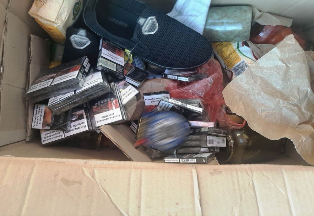 Autocar blindat cu alcool și țigări de contrabandă