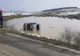 Autoturism scăpat de sub control, răsturnat într-o baltă 